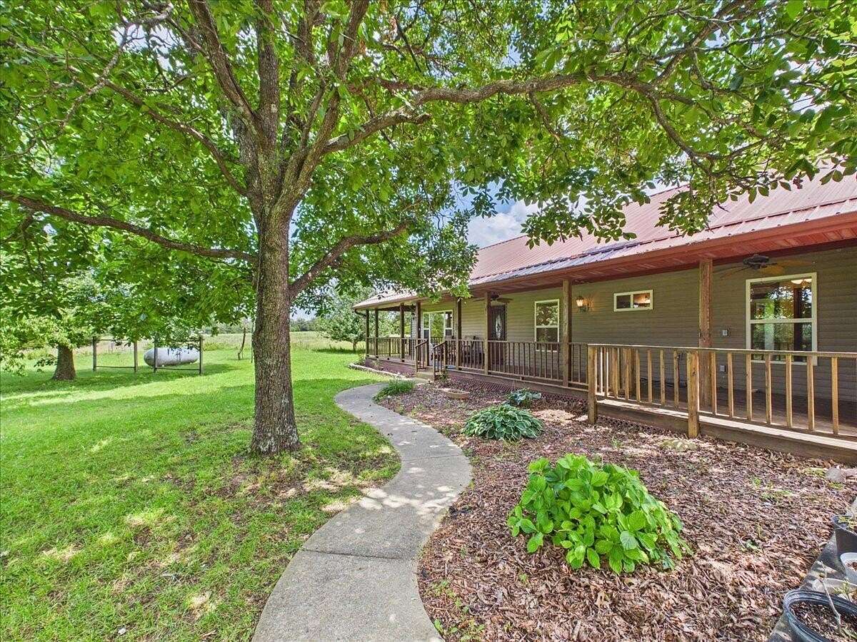 35.9 Acres of Land with Home for Sale in Urbana, Missouri