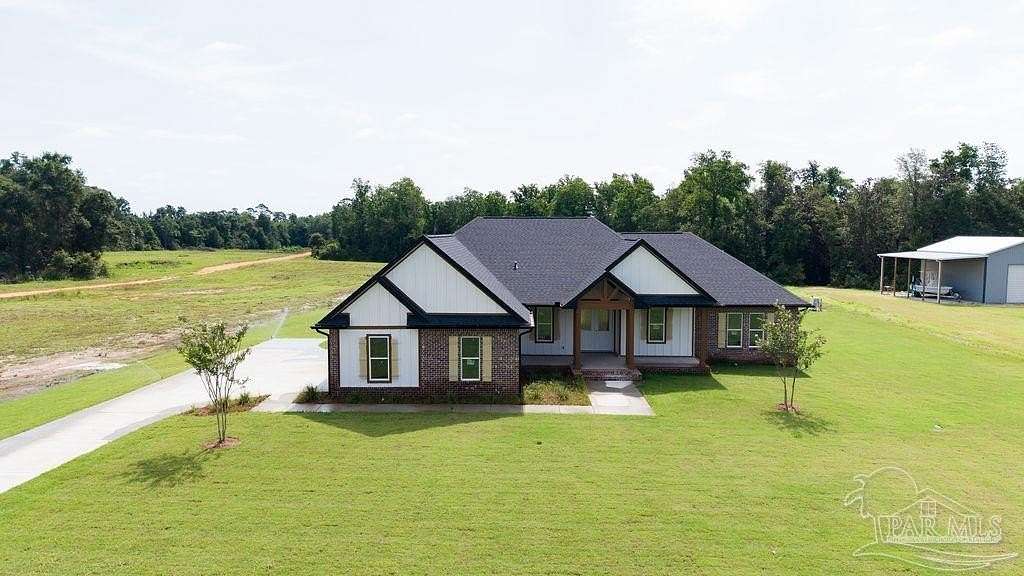 5 Acres of Land with Home for Sale in Jay, Florida