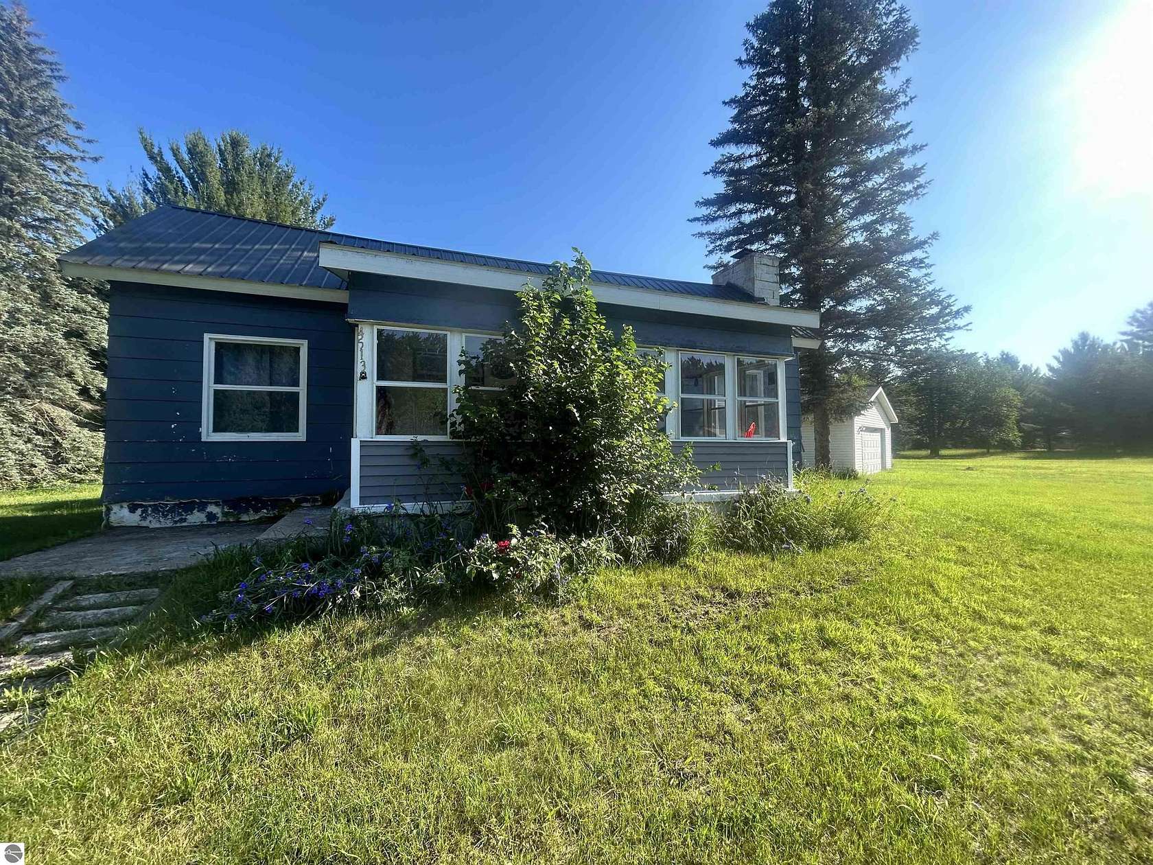 5 Acres of Land with Home for Sale in Mancelona, Michigan