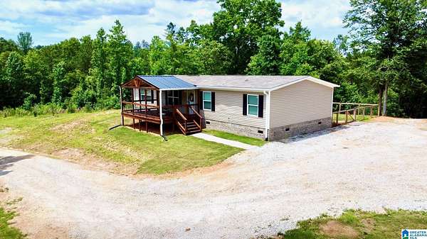 9 Acres of Land with Home for Sale in Heflin, Alabama