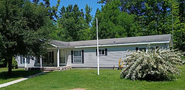 20 Acres of Land with Home for Sale in Lachine, Michigan