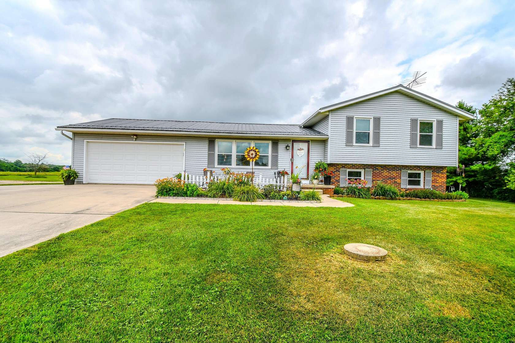 2.39 Acres of Land with Home for Sale in St. Paris, Ohio