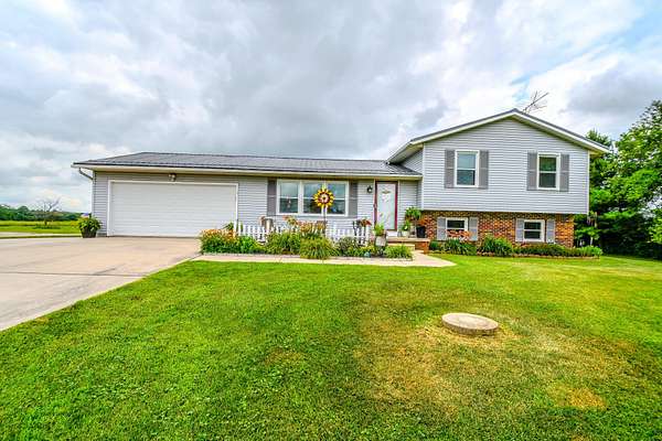 2.39 Acres of Land with Home for Sale in St. Paris, Ohio