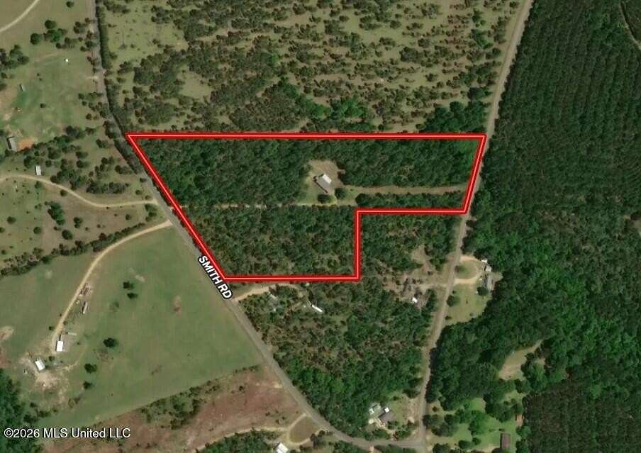 14.3 Acres of Land with Home for Sale in Lumberton, Mississippi