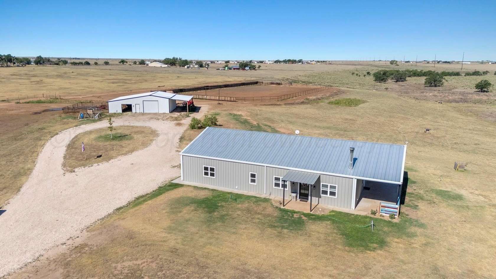 11 Acres of Land with Home for Sale in Canyon, Texas