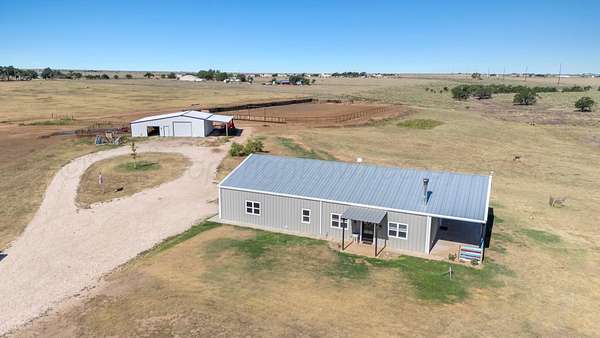 11 Acres of Land with Home for Sale in Canyon, Texas