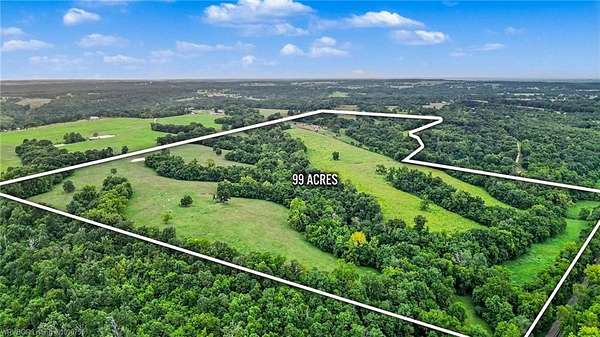 99.4 Acres of Recreational Land with Home for Auction in Gravette, Arkansas