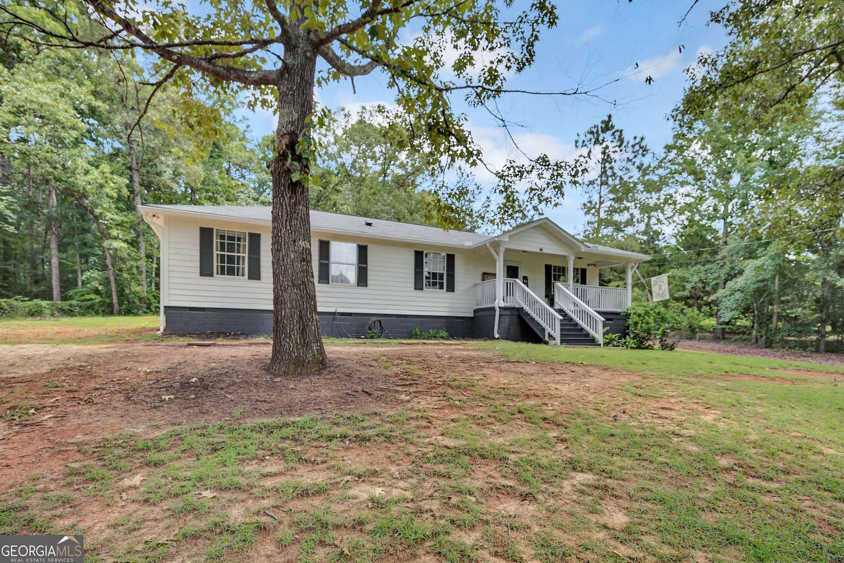 4.44 Acres of Land with Home for Sale in Mansfield, Georgia