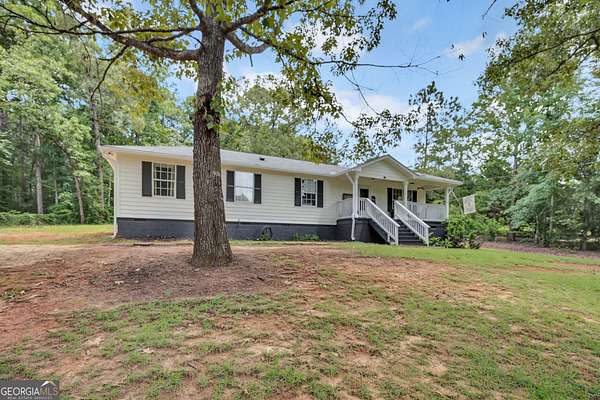 4.44 Acres of Land with Home for Sale in Mansfield, Georgia