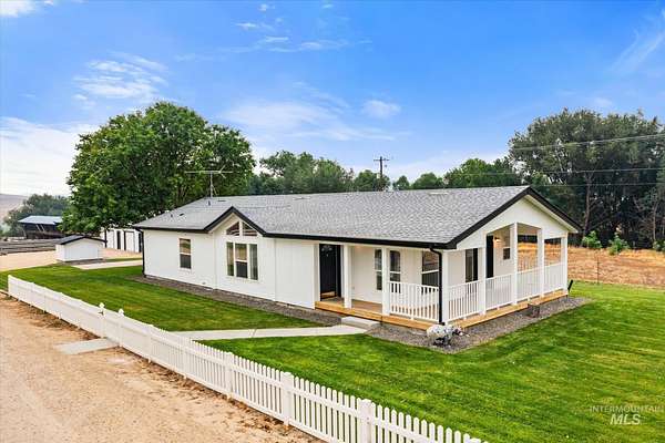 77.3 Acres of Agricultural Land with Home for Sale in Melba, Idaho