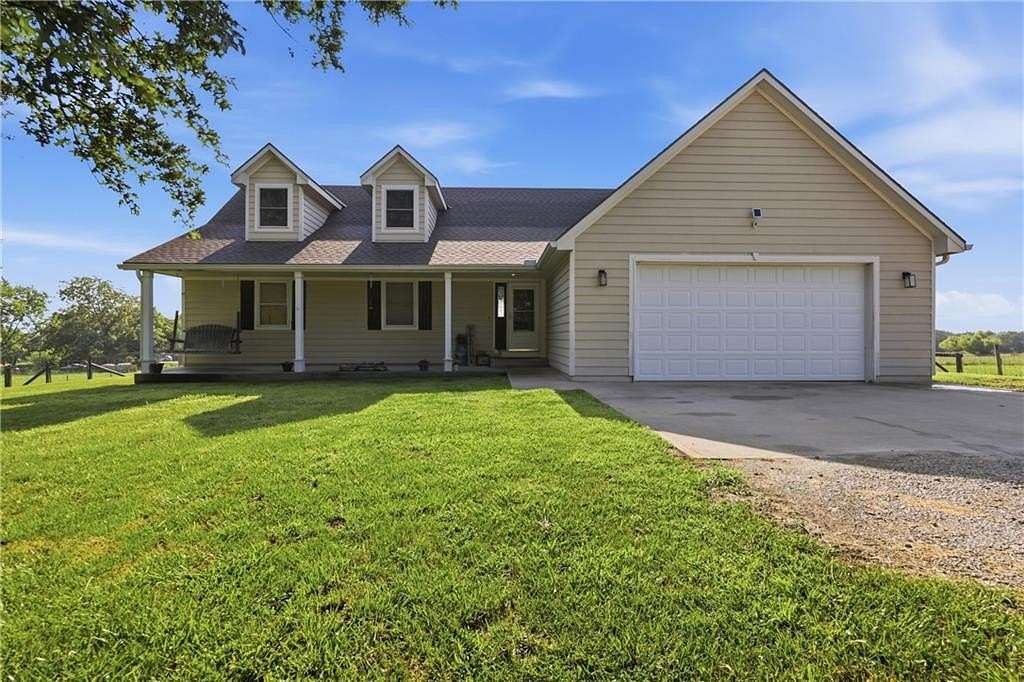 9.7 Acres of Land with Home for Sale in Adrian, Missouri