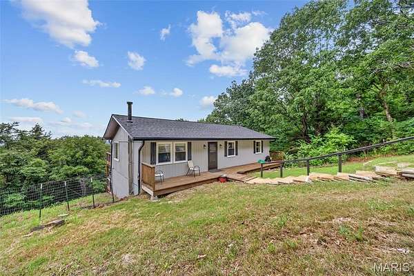 7.7 Acres of Land with Home for Sale in House Springs, Missouri
