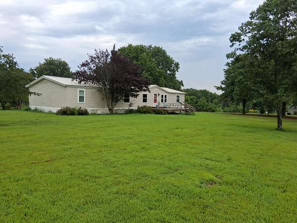 10.7 Acres of Land with Home for Sale in West Plains, Missouri