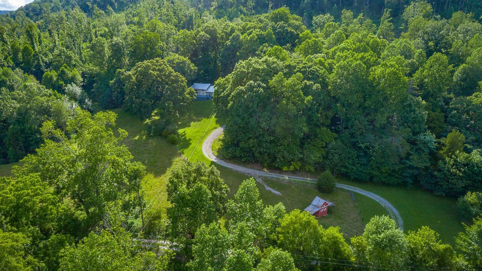 10.7 Acres of Land with Home for Sale in Pikeville, Tennessee