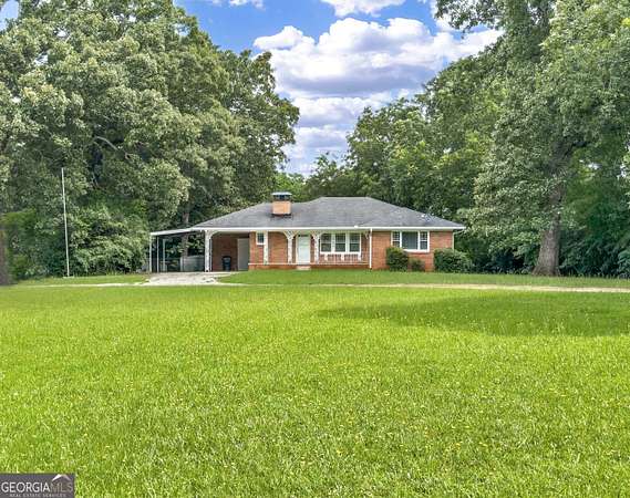 1.52 Acres of Land with Home for Sale in Morrow, Georgia