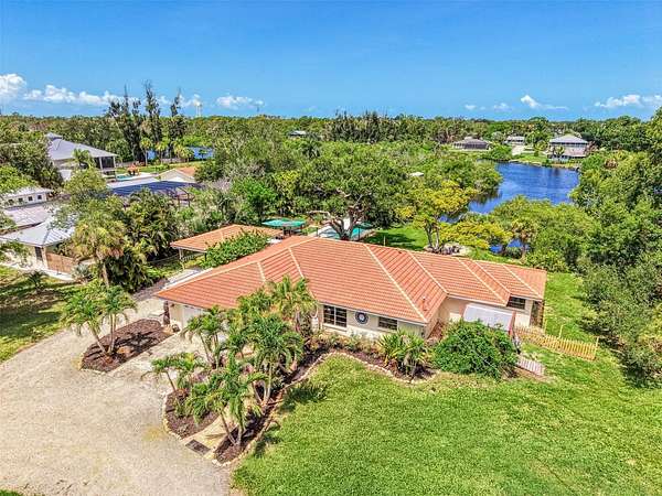 1.69 Acres of Land with Home for Sale in Englewood, Florida