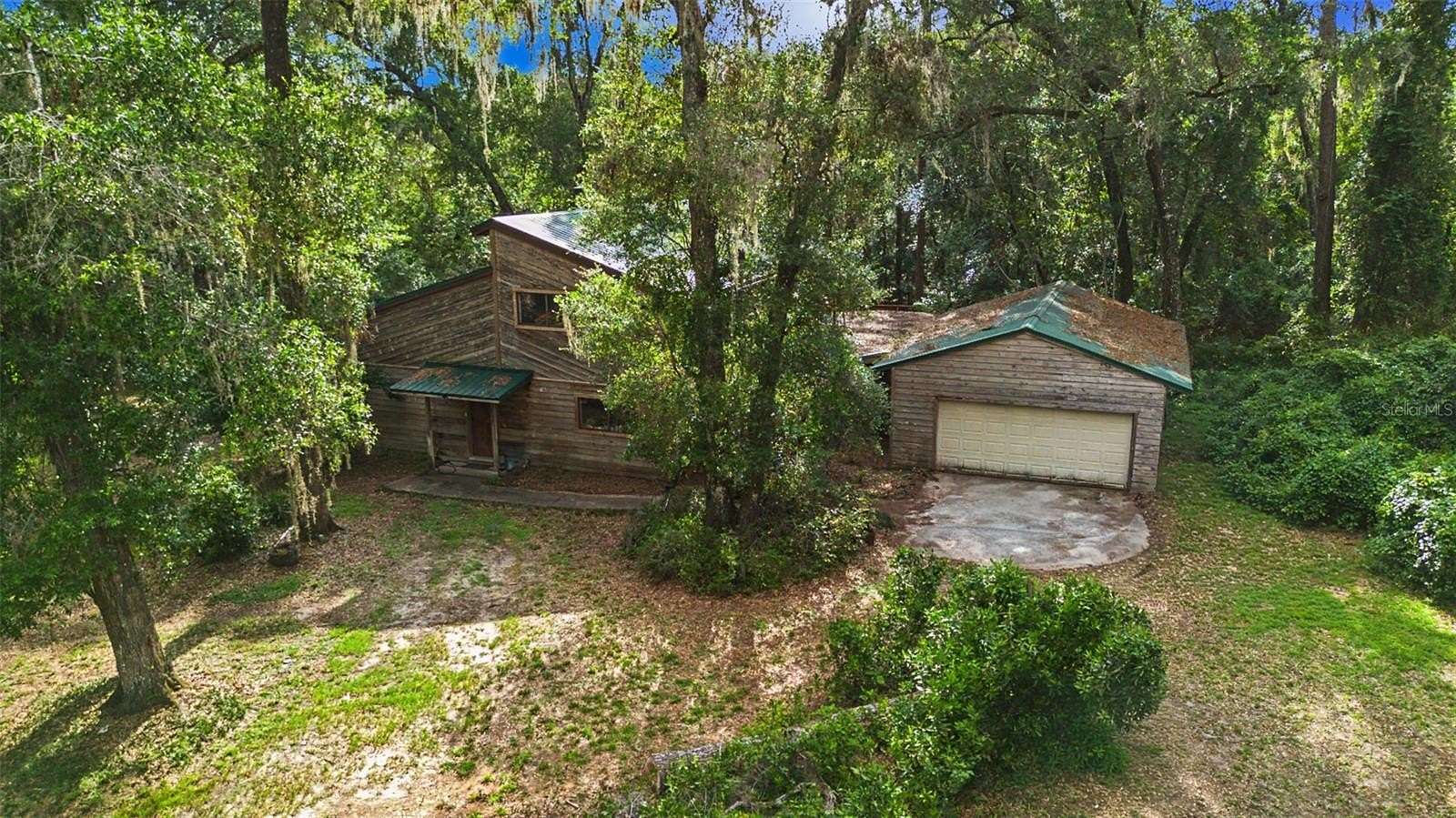 4.88 Acres of Land with Home for Sale in Gainesville, Florida