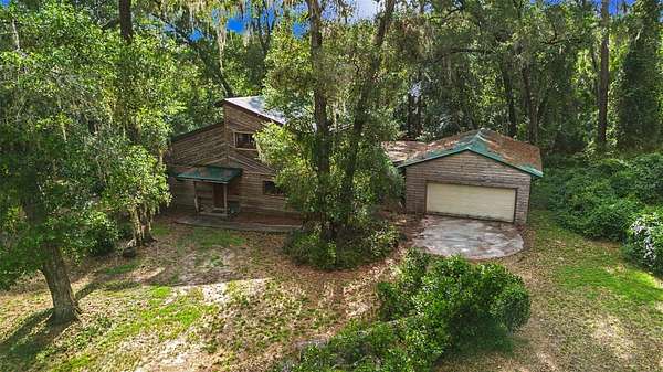 4.88 Acres of Land with Home for Sale in Gainesville, Florida