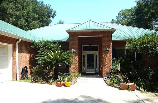 1.69 Acres of Land with Home for Sale in Melrose, Florida