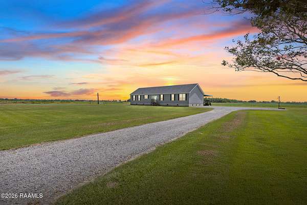 10.4 Acres of Land with Home for Sale in Rayne, Louisiana