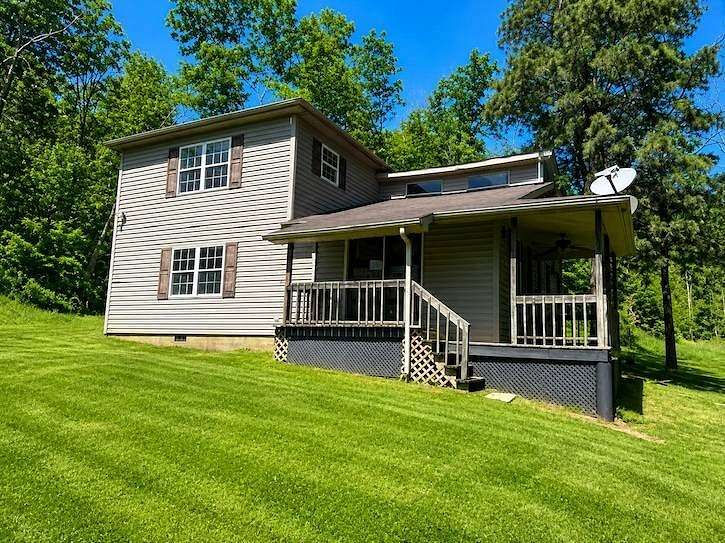 9.68 Acres of Land with Home for Auction in Chesapeake, Ohio