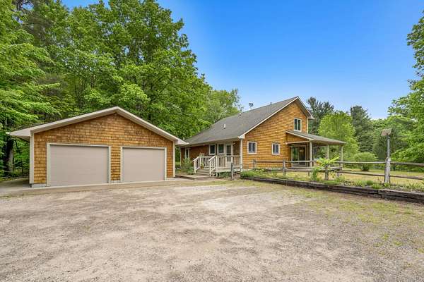 10 Acres of Land with Home for Sale in Brethren, Michigan