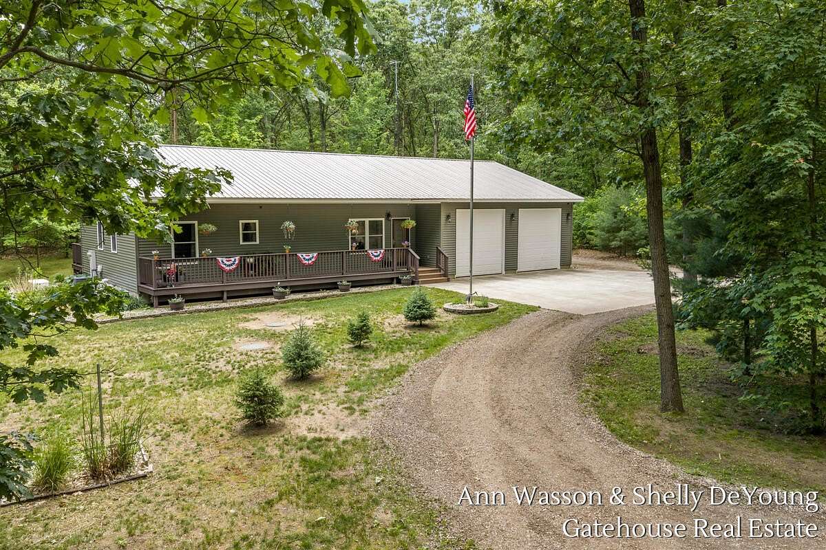 3.52 Acres of Land with Home for Sale in Sand Lake, Michigan