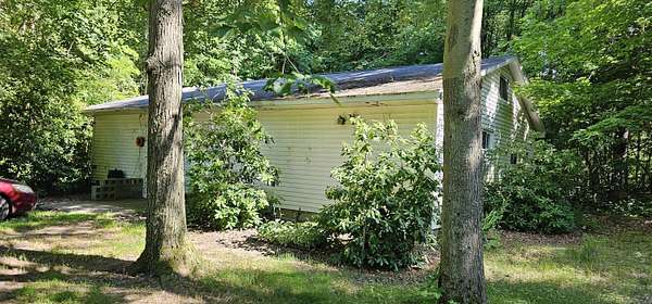20 Acres of Recreational Land with Home for Sale in Grand Junction, Michigan