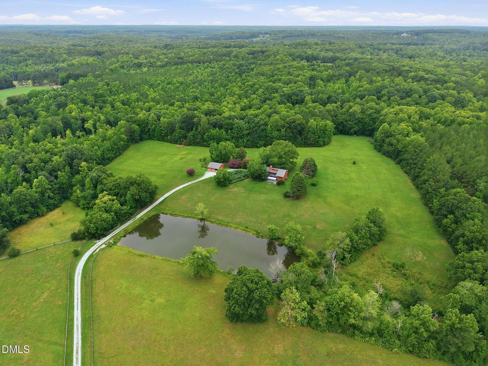 29.6 Acres of Agricultural Land with Home for Sale in Bahama, North Carolina