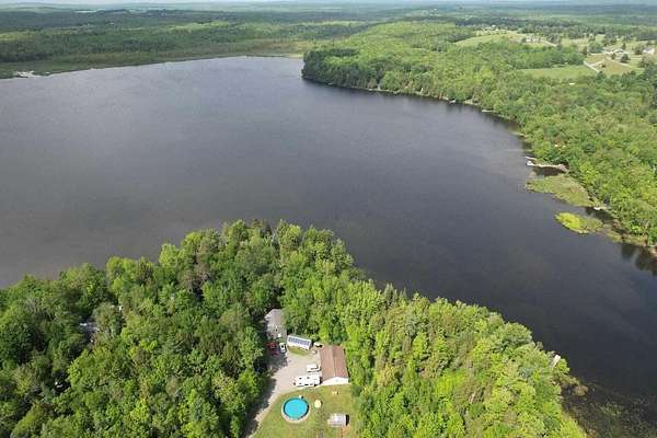 5 Acres of Land with Home for Sale in Palmyra, Maine