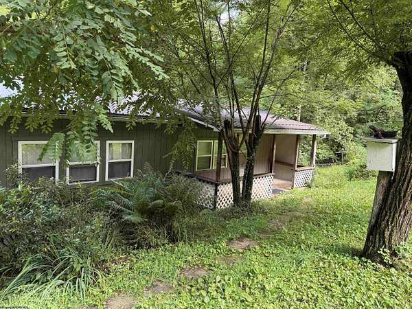 5.53 Acres of Land with Home for Sale in Belington, West Virginia