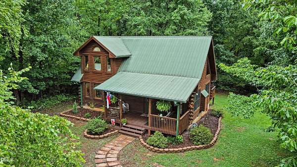 7.32 Acres of Land with Home for Sale in Gibsonville, North Carolina