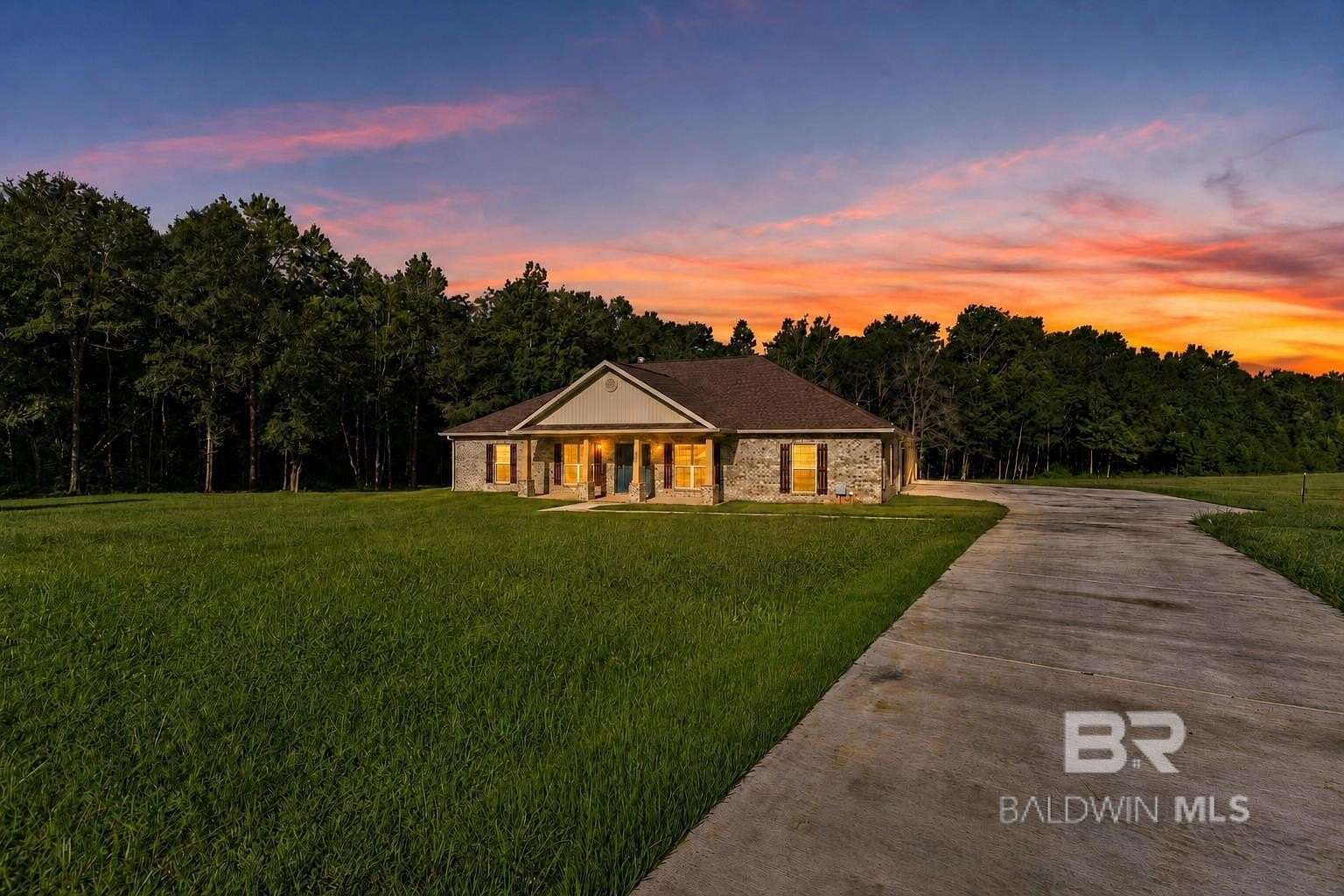 3.1 Acres of Land with Home for Sale in Irvington, Alabama