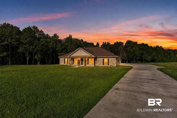 3.1 Acres of Land with Home for Sale in Irvington, Alabama