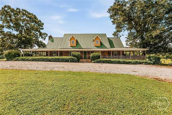 145 Acres of Land with Home for Sale in Carlton, Georgia