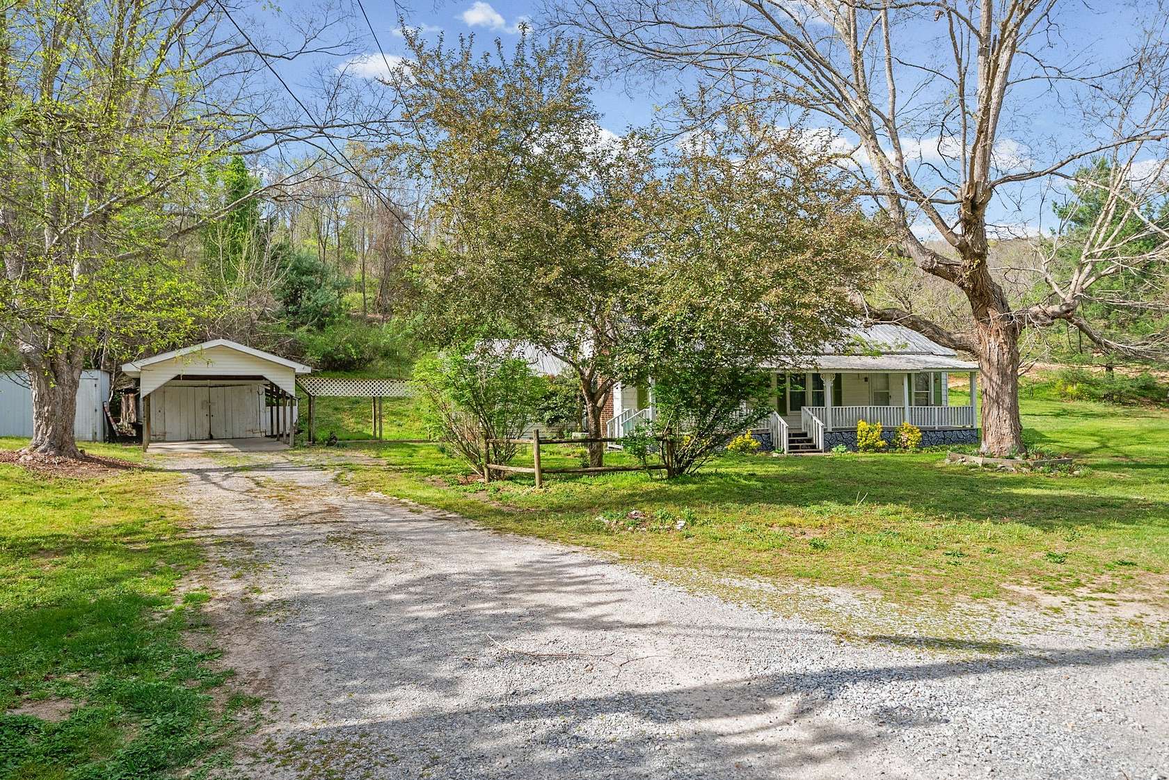 23.3 Acres of Land with Home for Sale in Erin, Tennessee