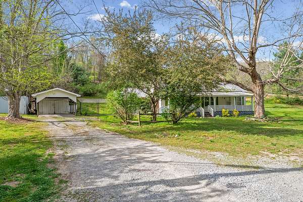 23.3 Acres of Land with Home for Sale in Erin, Tennessee