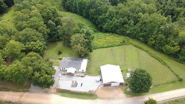 5 Acres of Land with Home for Sale in Centerville, Tennessee