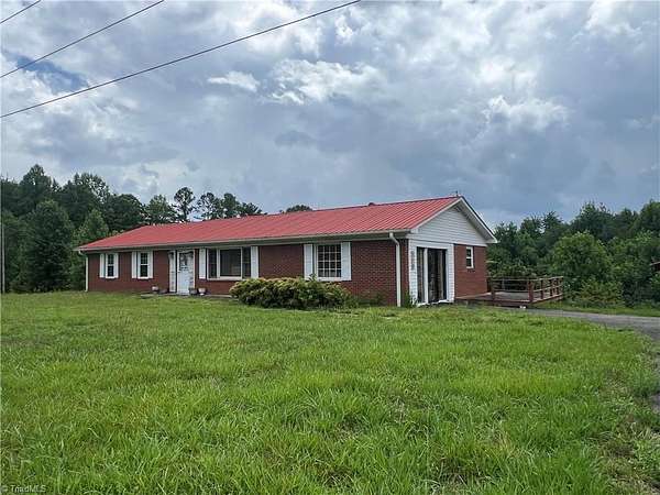 4 Acres of Land with Home for Sale in Dobson, North Carolina