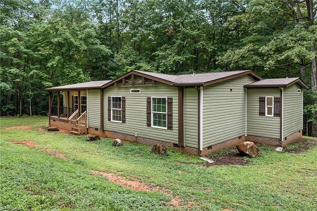 4.5 Acres of Land with Home for Sale in Stokesdale, North Carolina