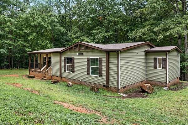 4.5 Acres of Land with Home for Sale in Stokesdale, North Carolina