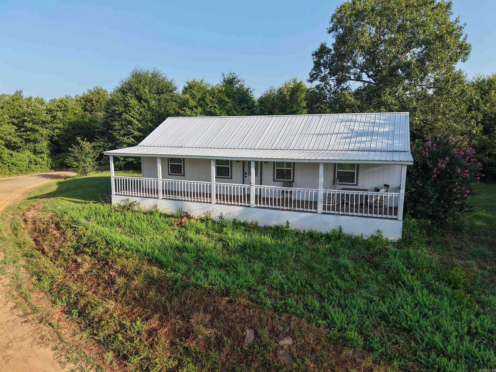 120 Acres of Land with Home for Sale in Mena, Arkansas
