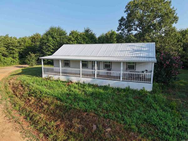120 Acres of Land with Home for Sale in Mena, Arkansas