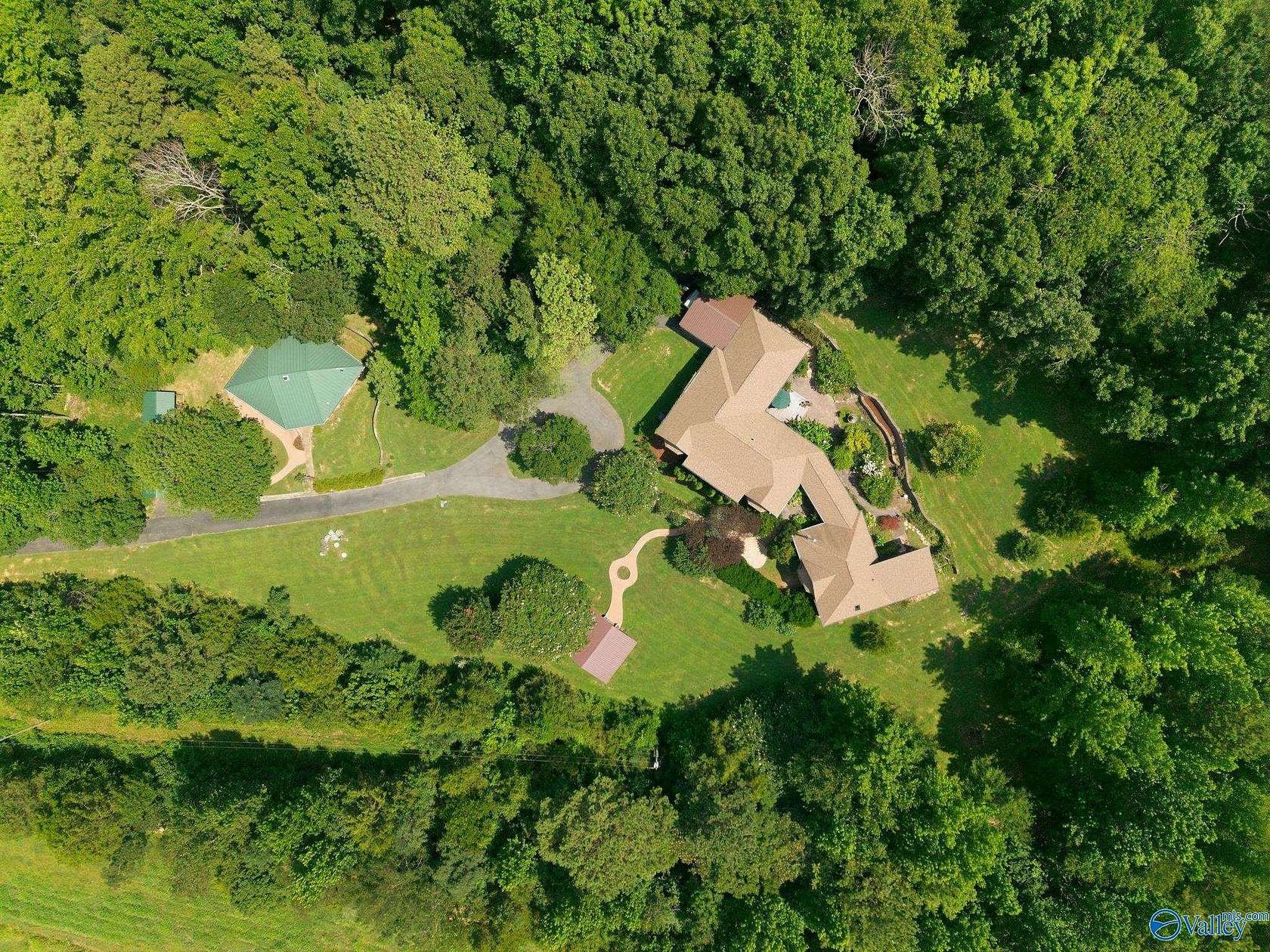 49 Acres of Recreational Land with Home for Sale in New Market, Alabama