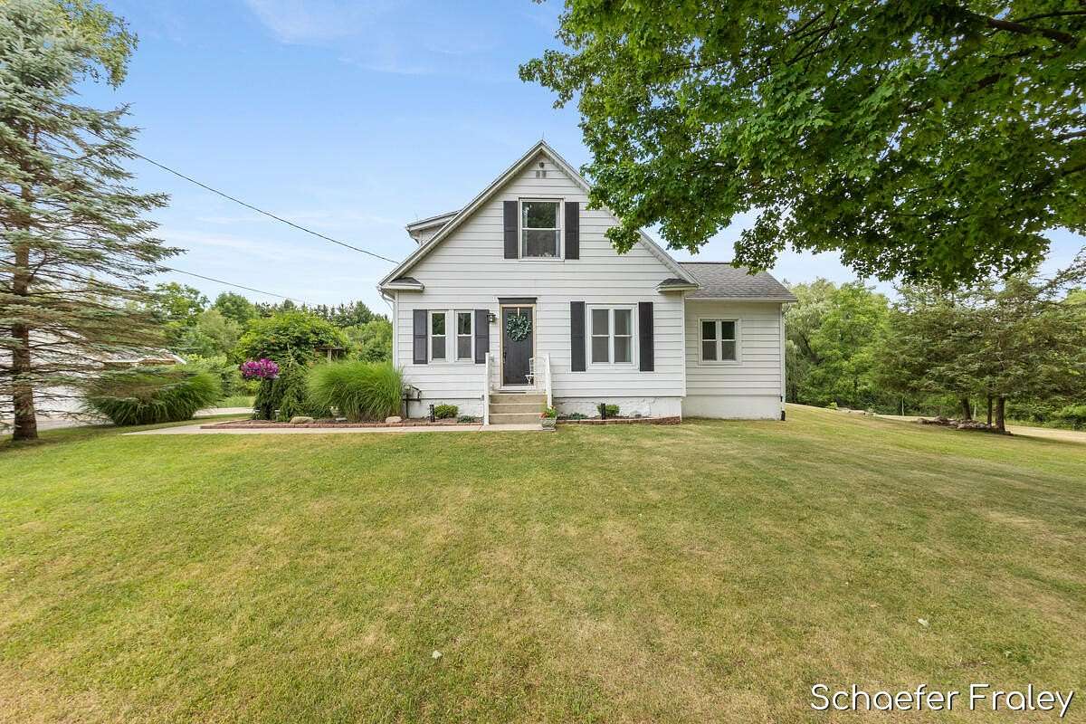 6 Acres of Land with Home for Sale in Caledonia, Michigan