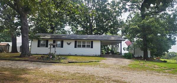 66 Acres of Land with Home for Sale in Washburn, Missouri