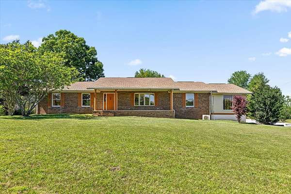 5.64 Acres of Land with Home for Sale in Palmer, Tennessee