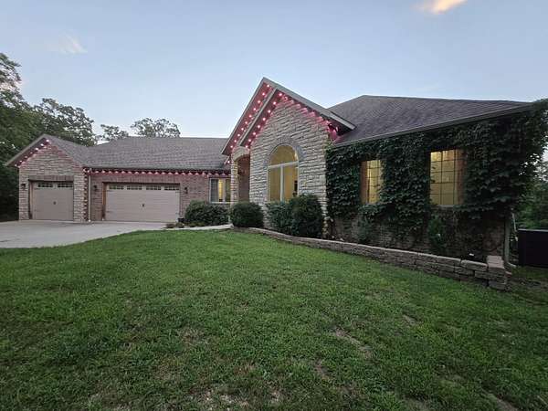 9.87 Acres of Land with Home for Sale in Pleasant Hope, Missouri