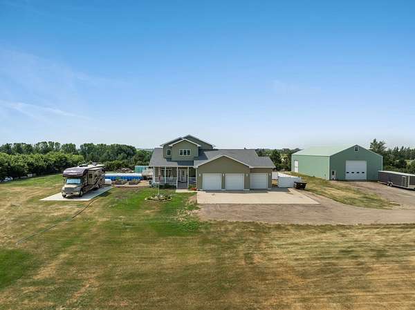 3 Acres of Land with Home for Sale in Minot, North Dakota