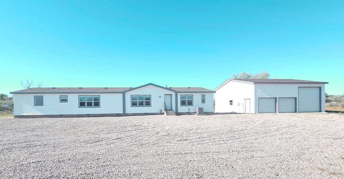 2.5 Acres of Land with Home for Sale in Aztec, New Mexico